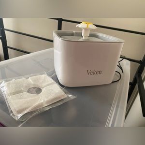 Pet water fountain with filter.